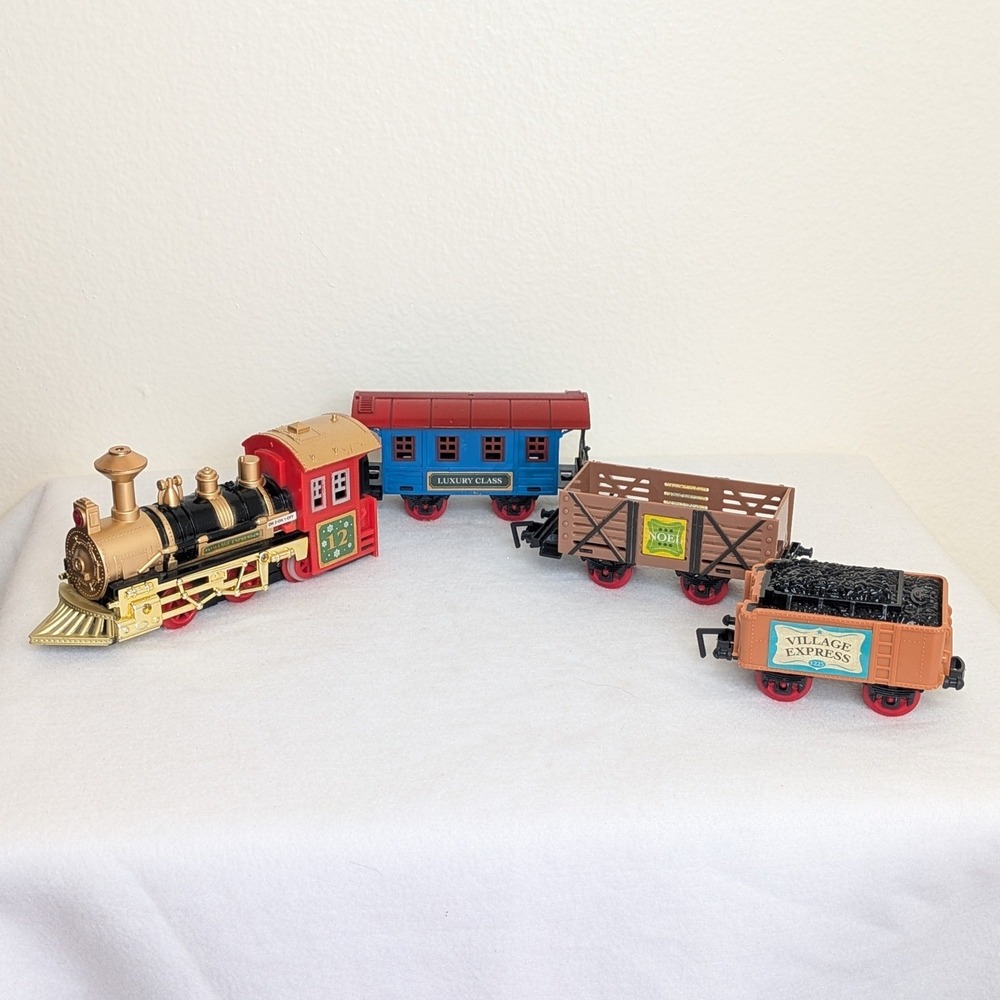 Village Express Battery Operated Toy Train Set 4 Piece Holiday Locomotive Noel